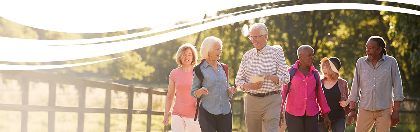 Senior tour group walking along a nature trail in Brazosport, Texas.